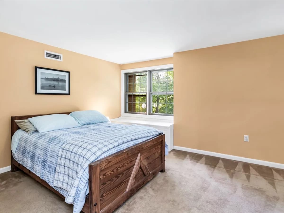 Single-level bedroom with clear floor space and natural light